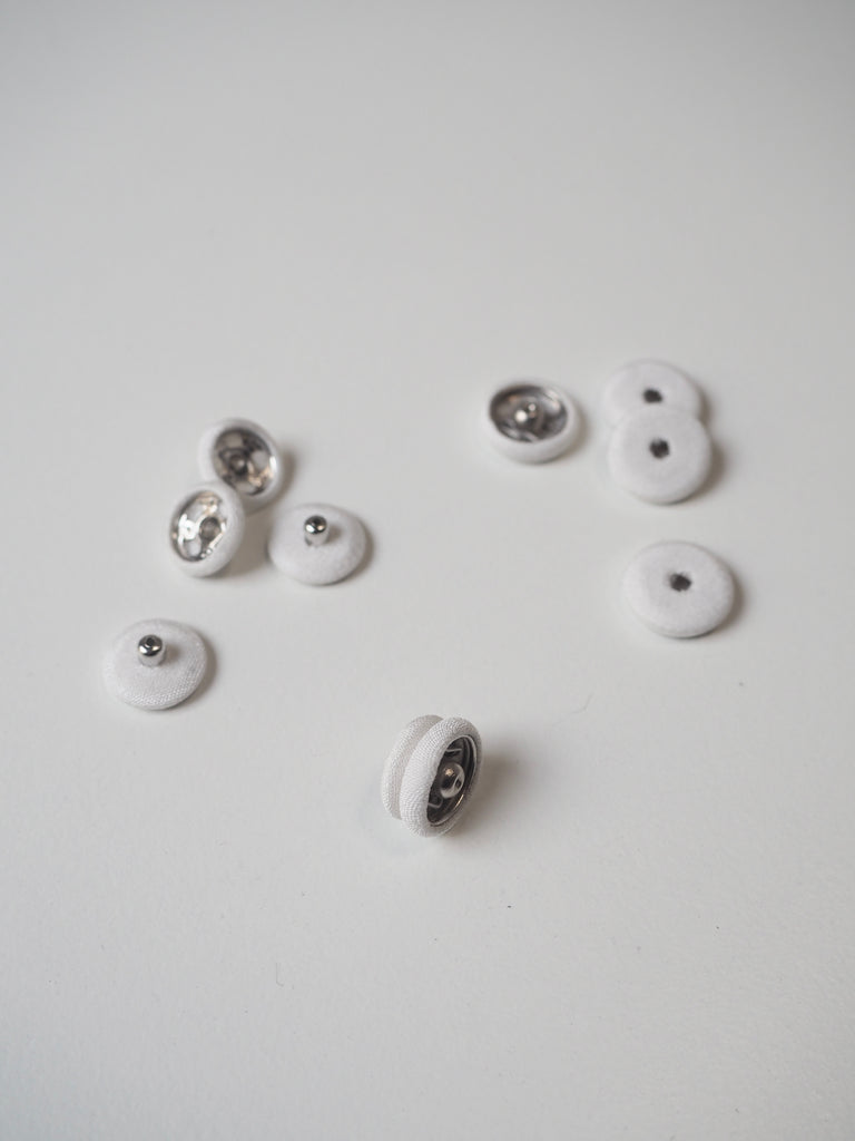 White Fabric Covered Press Studs 12mm