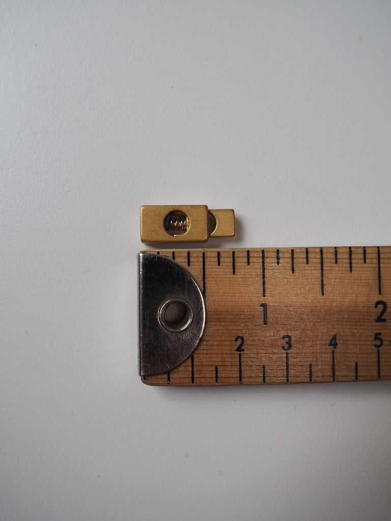 Gold Metal Cord Toggle